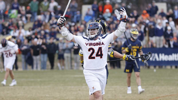 Payton Cormier celebrates after scoring a goal during the Virginia men's lacrosse game against Michigan at Klockner Stadium.